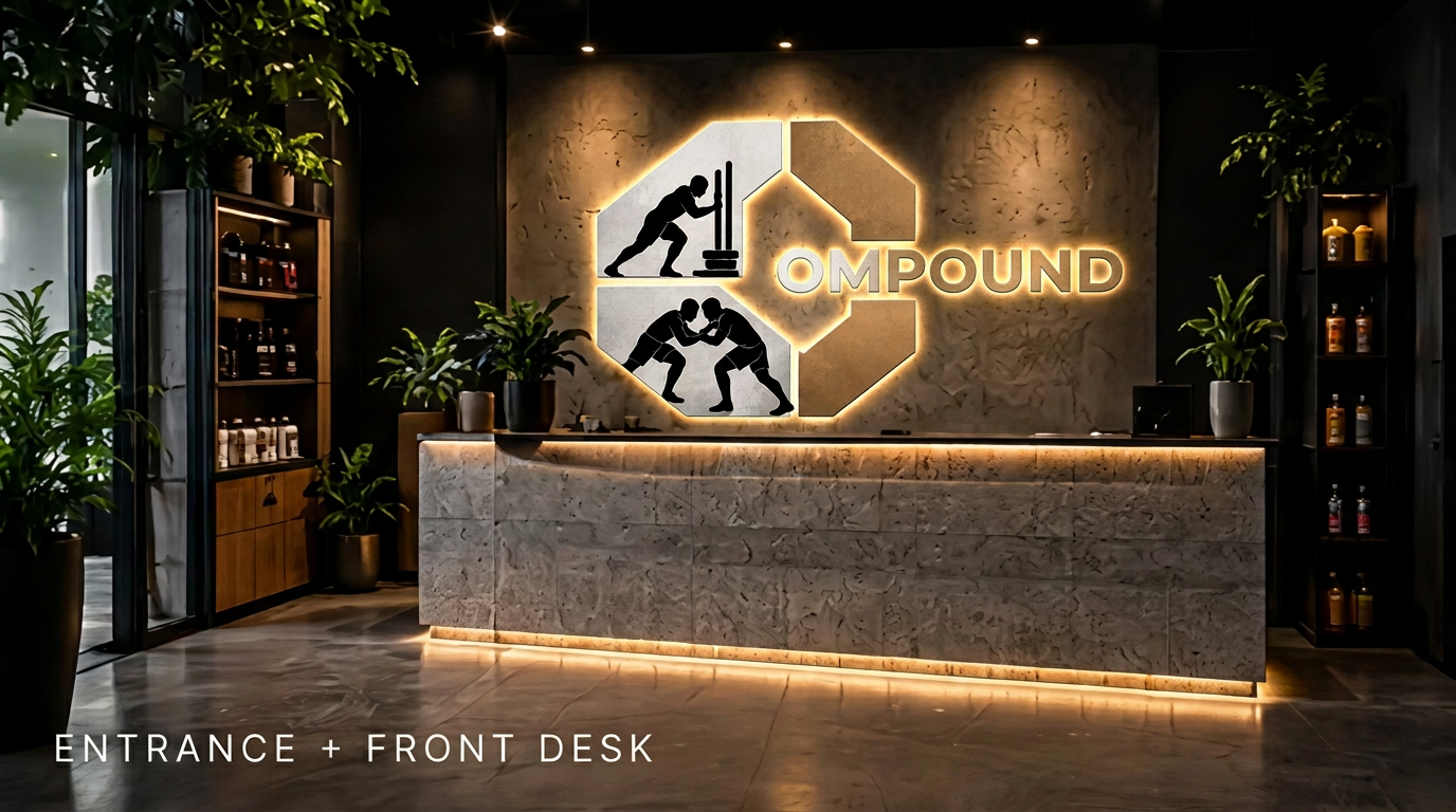 The shared entrance and front desk, with The Compound emblem on the wall